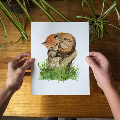 a person holding a card with a picture of a bird on it